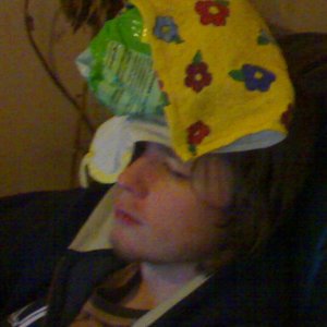 Sob with a Bag o peas on his head
