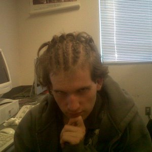 Ya thats right Corn rows on a White guy lol