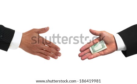 stock-photo-bribery-handshake-with-money-186419981.jpg