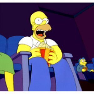 Homer Simpson earing popcorn